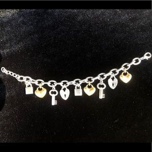 Adorable gold and silver charm bracelet